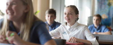 Dayspring Christian Academy students study together in class.